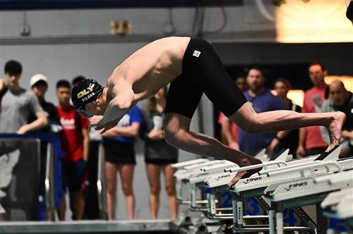 Devin diving off starting block