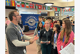  Ike teacher talking to junior high school students