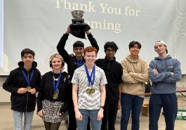 UAIS Quiz Bowl team celebrating their win