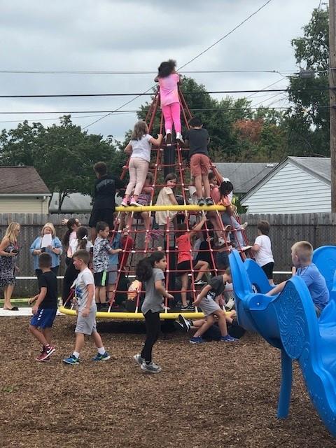 Students on Playground Equipment