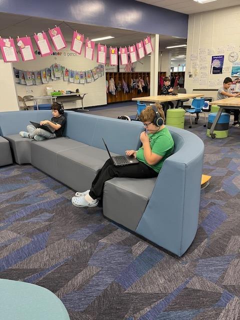 Students in media center at Rose Kidd